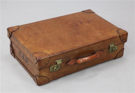 A Finnigans of Manchester tan pigskin suitcase, L.2ft 4in.